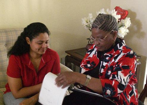 Dr. Helen Adams Teaching a Client in the Comfort of their own Home.